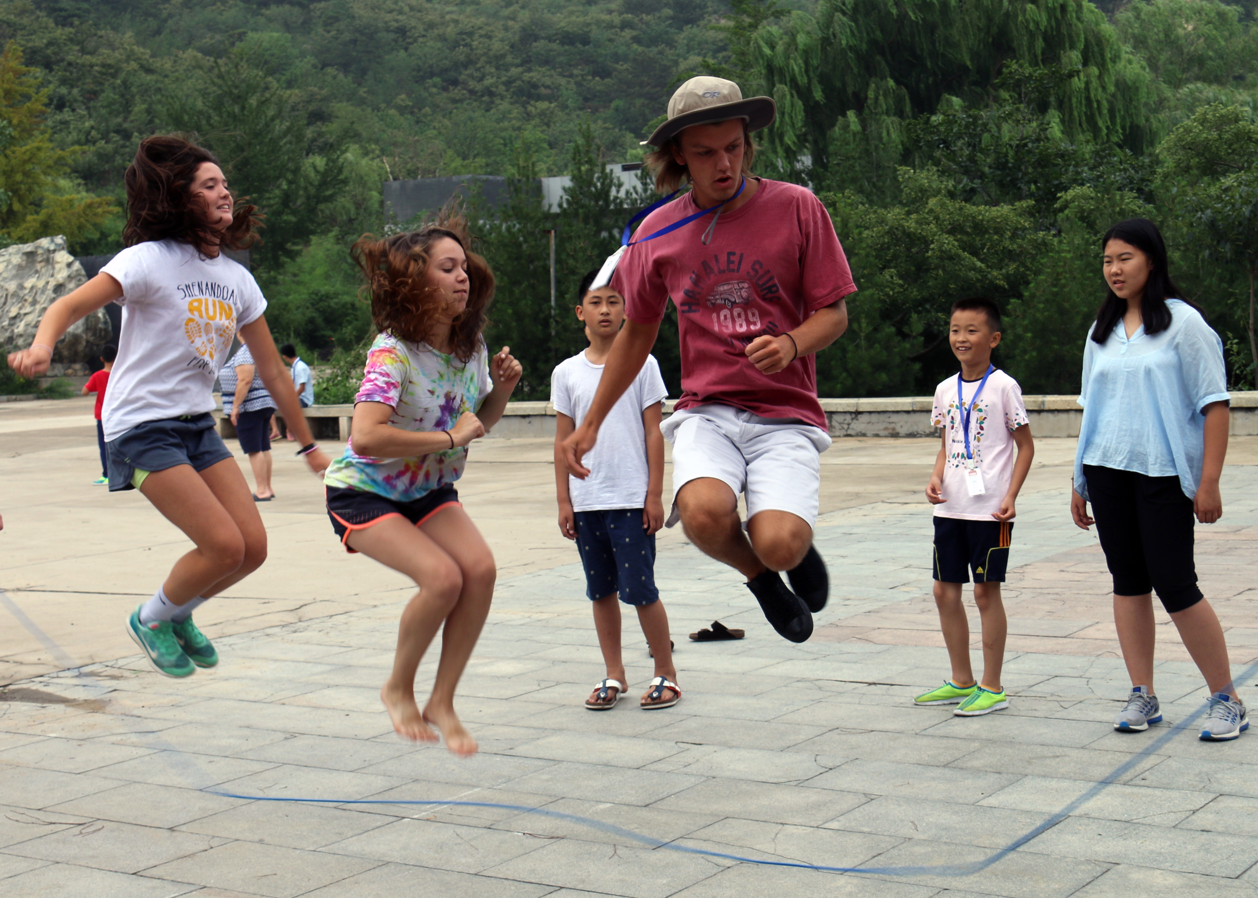 Students jump rope during a summer camp