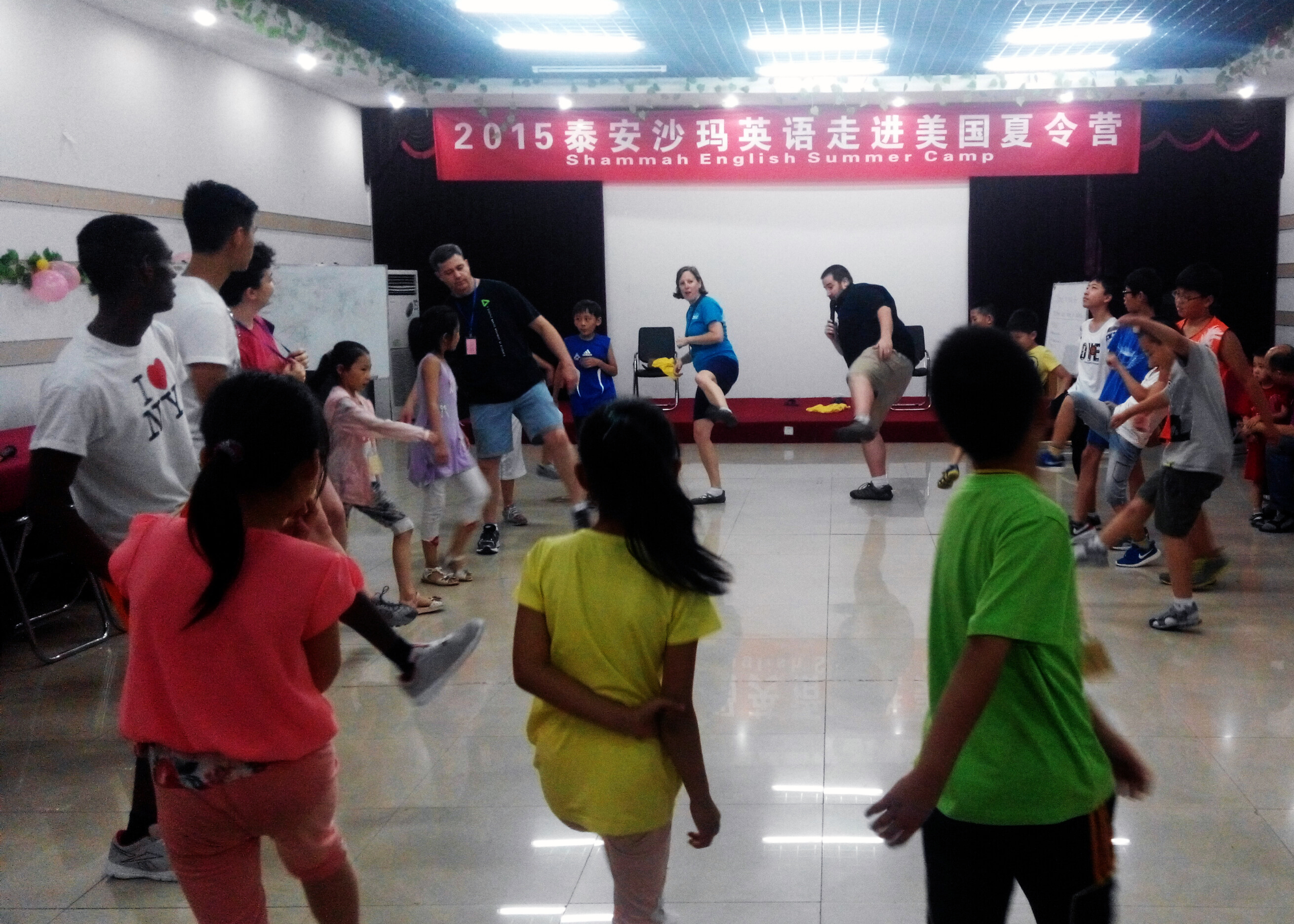 Children playing a silly game at camp